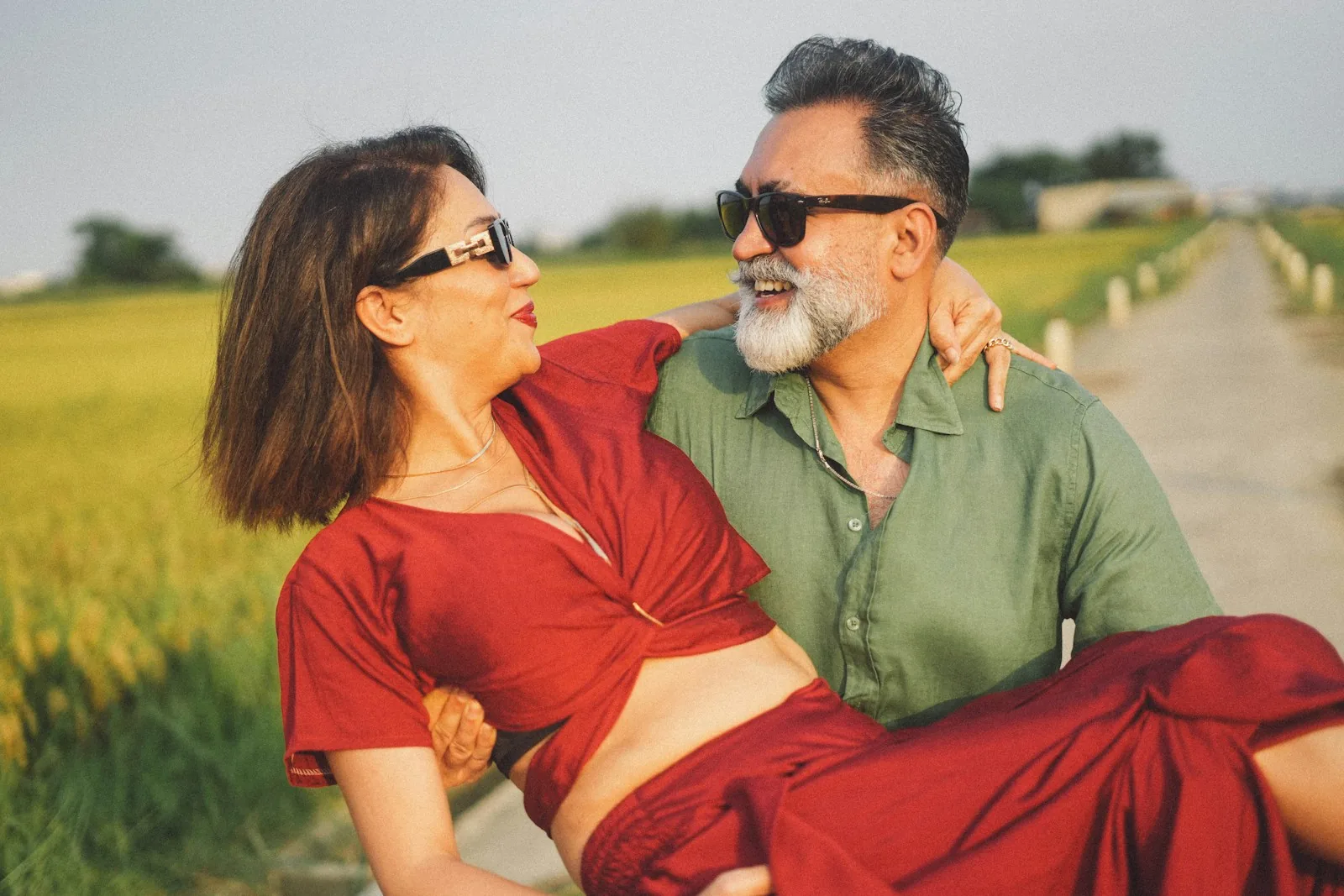 Couple in golden hour field